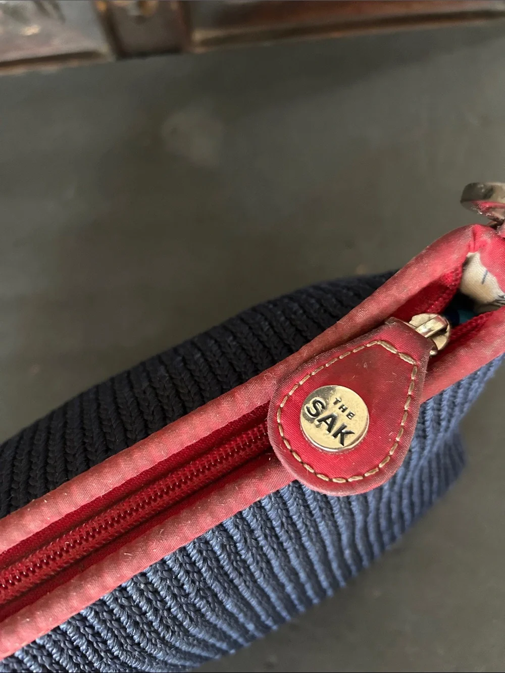 The Sak Navy Blue Crochet Woven Shoulder Bag with Red Trim